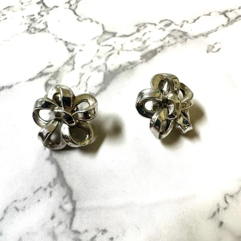 Trifari silver tone vintage clip on earrings